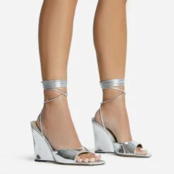 EGO Anthems Lace Up Square Peep Toe Wedge Heel In Silver Metallic Patent -EGO Sales 06 10 22 fw12761 sq