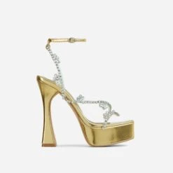 EGO Show-Ahead Clear Perspex Strap Diamante Detail Platform Flared Block Heel In Gold Faux Leather -EGO Sales 06 10 22 fw5700 sq