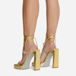 EGO In-The-Game Lace Up Diamante Butterfly Detail Silver Glitter Sole Square Toe Platform Thin Block Heel In Gold Faux Leather -EGO Sales 16 08 22 fw12643