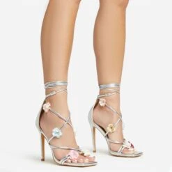 EGO Flower-Child Lace Up Strappy 3D Flower Detail Square Toe Stiletto Heel In Silver Faux Leather