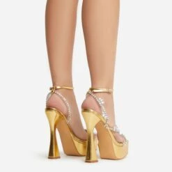 EGO Show-Ahead Clear Perspex Strap Diamante Detail Platform Flared Block Heel In Gold Faux Leather -EGO Sales 22 09 22 fwbags0205 sq