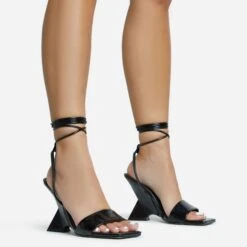 EGO Crashing Lace Up Square Toe Cut Out Wedge Heel In Black Patent