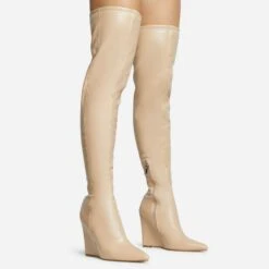 EGO Fired-Up Pointed Toe Wedge Heel Over The Knee Thigh High Sock Boot In Nude Faux Leather