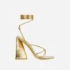 EGO Love-Booth Lace Up Knotted Strap Detail Square Toe Sculptured Flared Block Heel In Gold Faux Leather